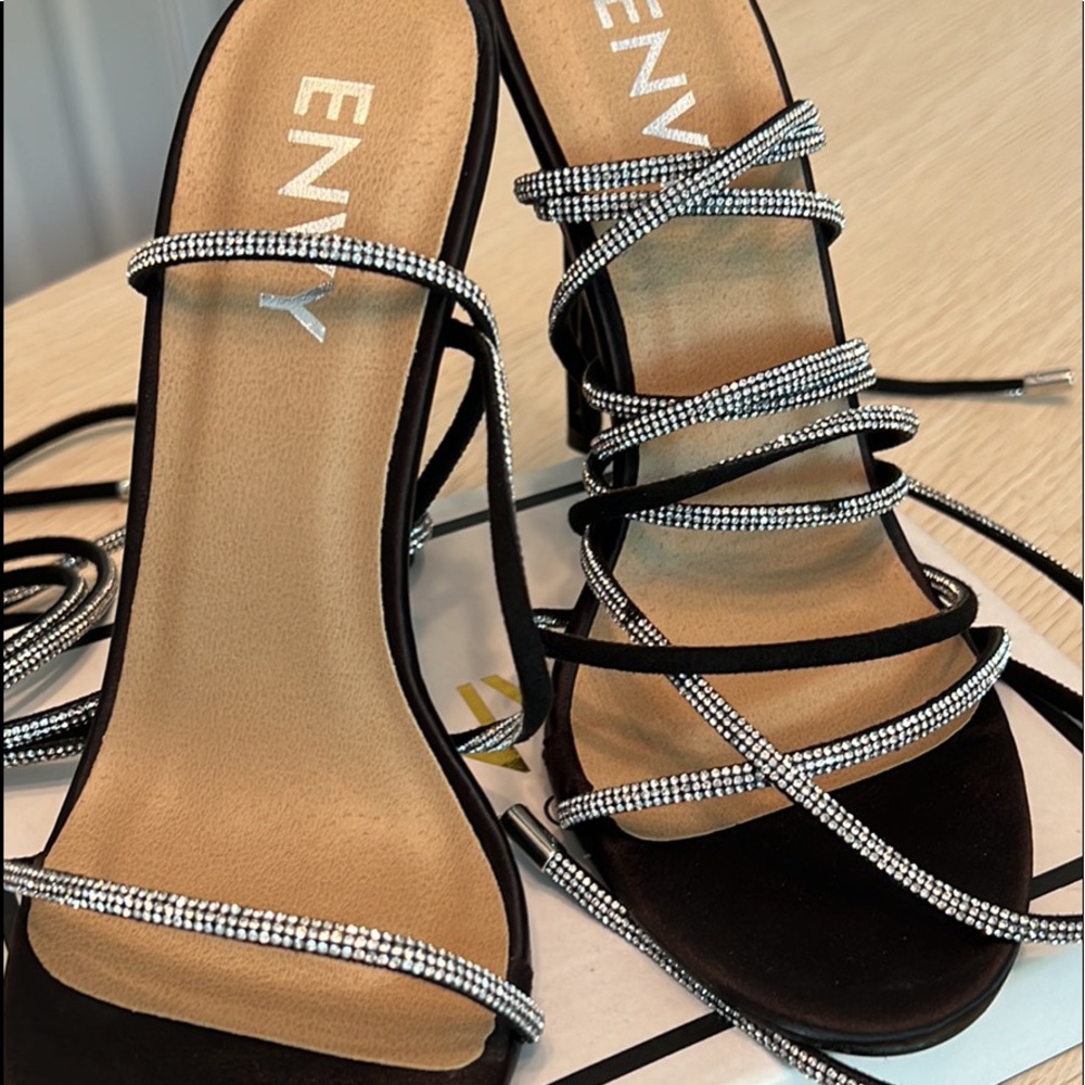 Envy brand strappy high heels with rhinestones. Size 6 and 4”tall tie up the leg